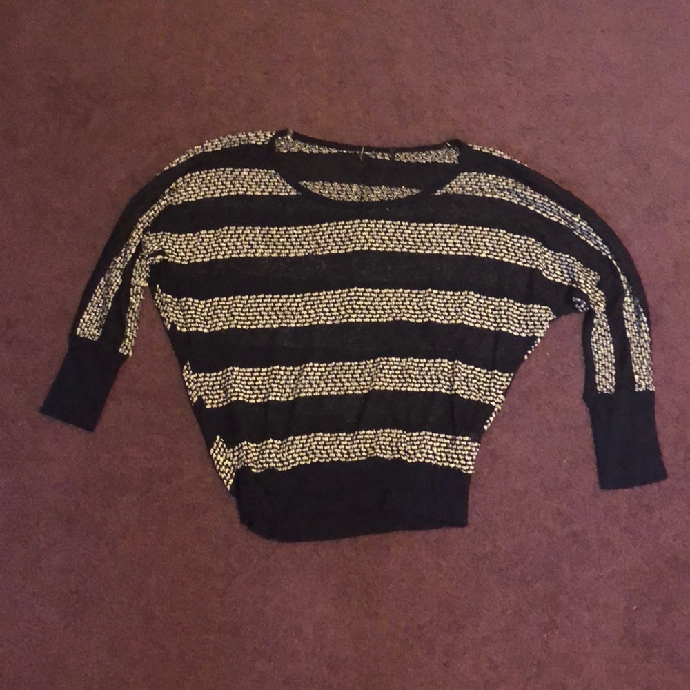 Blue and white striped half sleeve shirt.